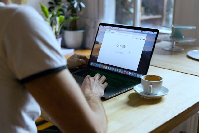 Person searching for a website on Google